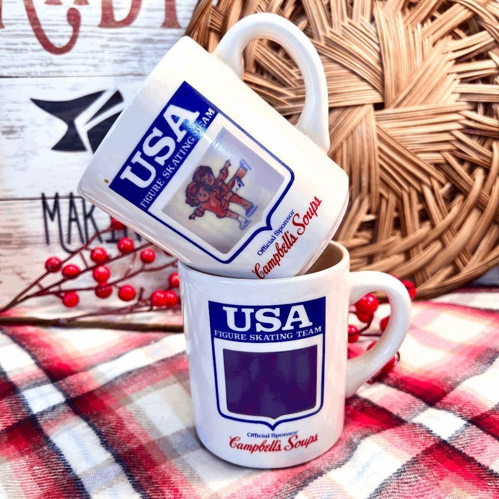 Set of Two Vintage Campbells Soup USA Figure Skating Heat Activiated Mugs
